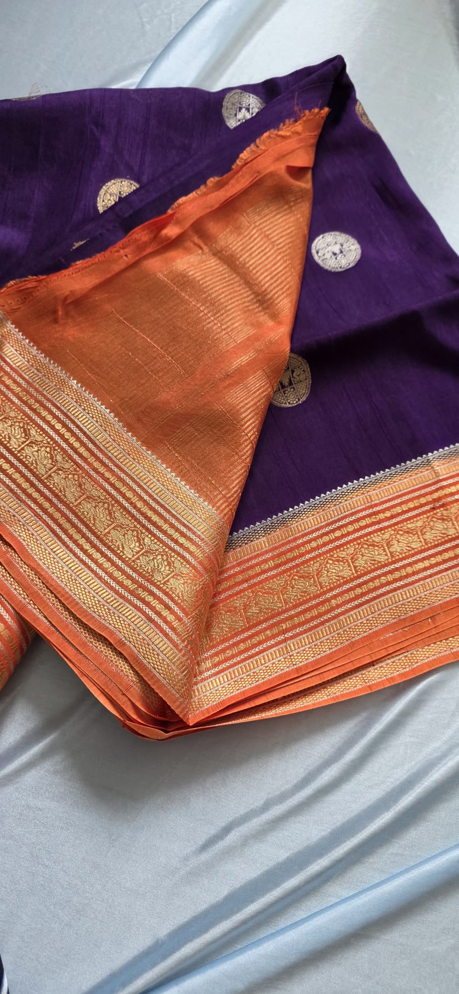 Elegant Deep pruple Silk Blend Saree with Contrast orange Zari Border