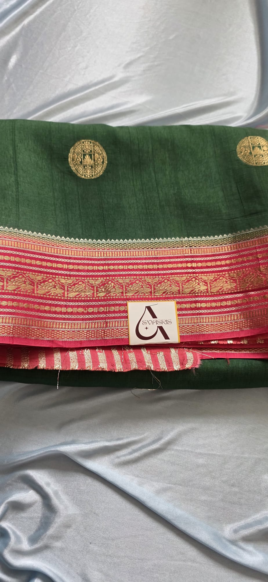 Elegant Dark Green Silk Blend Saree with Contrast Pink Zari Border